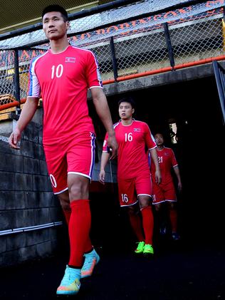 Striker Pak Kwang-Ryong leads out members of the North Korea football team at Leichhardt Oval. Picture: Richard Dobson