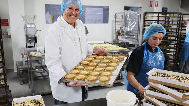 Madhouse Bakehouse founder Ross Galettis, left, pictured at his Chullora business with pastry chef Anna Suleiman. Picture Rohan Kelly