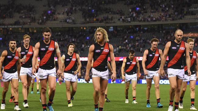 Dyson Heppell leads a disappointing Bombers from Etihad Stadium after the loss to the Western Bulldogs. Pic: AAP