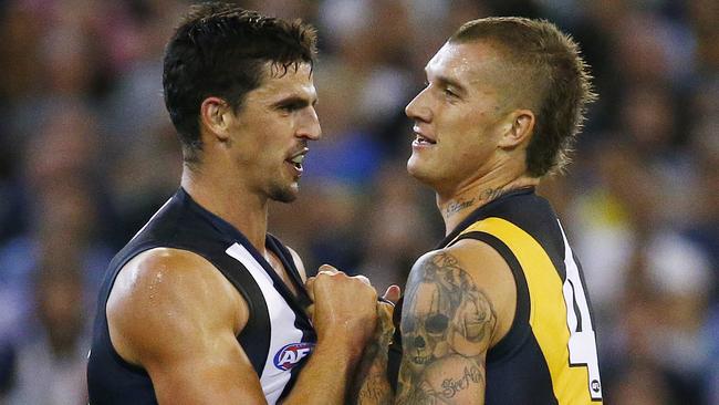 Two superstars Scott Pendlebury and Dustin Martin get up close and personal. Picture: Colleen Petch