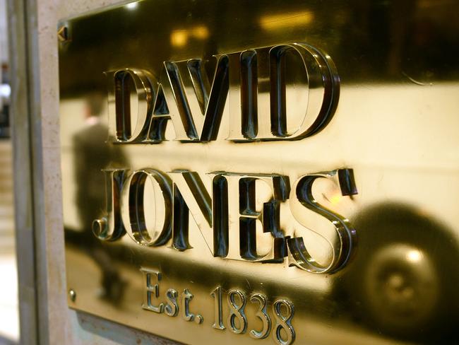 In this photo taken on June 18, 2014 a shopper leaves the David Jones store in Sydney. South African retail giant Woolworths on June 24 announced a bid to buy out Australian fashion chain Country Road as part of its plan to takeover prestigious department store David Jones. AFP PHOTO/Peter PARKS