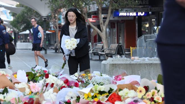 People continue to lay flowers on Monday morning. Picture: NCA NewsWire / Rohan Kelly