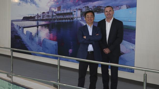 Founder of Luye Medical, chairman Liu Dianbo, left, with CEO of Healthe Care Steve Atkins.