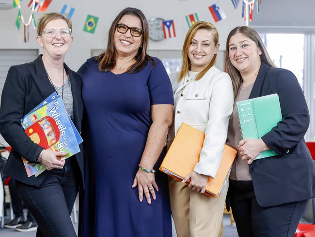 St Dominic’s Primary School principal Katie Broadbent and Community Hub leader Caroline Menassa with mums who were supported by the hub, Shatha Alhadai and Enas Hano. Picture: Tim Carrafa