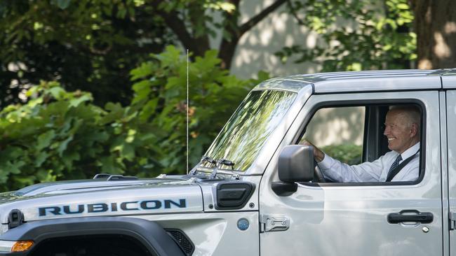 US President Joe Biden behind the wheel of an electric Jeep Rubicon. Picture: Getty Images