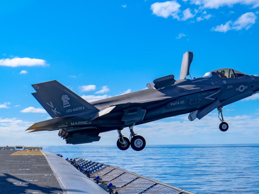 A U.S. Marine Corps F-35B Lightning II with Marine Fighter Attack Squadron 121 attached to Marine Medium Tiltrotor Squadron 265 (Reinforced), 31st Marine Expeditionary Unit (MEU), departs the flight deck of amphibious assault ship USS America (LHA 6), during Talisman Sabre on July 19, 2021. The F-35B Lightning IIÃ¢â&#130;¬â&#132;¢s fifth generation strike fighter capabilities bring more lethality and flexibility to combat commanders than any other aircraft platform. Australian and U.S. forces combine biannually for Talisman Sabre, a month-long multi-domain exercise that strengthens allied and partner capabilities to respond to the full range of Indo-Pacific security concerns. The 31st MEU is operating aboard ships of America Expeditionary Strike Group in the 7th fleet area of operations to enhance interoperability with allies and partners and serve as a ready response force to defend peace and stability in the Indo-Pacific region. (U.S. Marine Corps photo by Staff Sgt. John Tetrault)