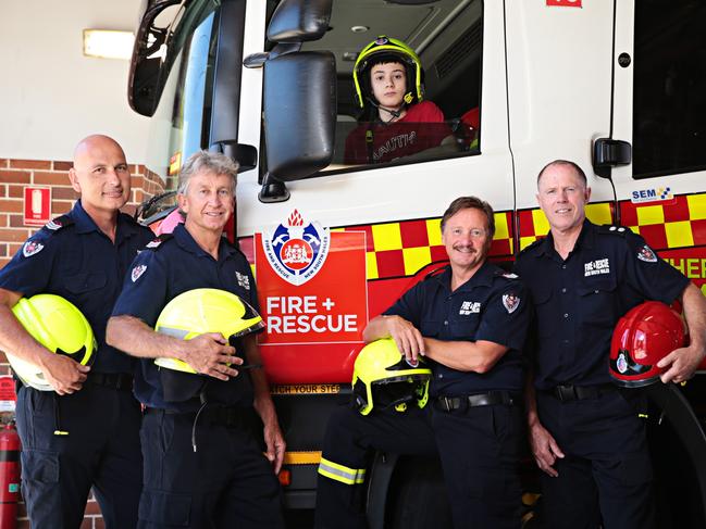 Firefighters (from left) Pavel Novotny, John Danzey, Paul Roussis and Kieran Taylor were reunited with Mark Teuma after saving him. Picture: Adam Yip