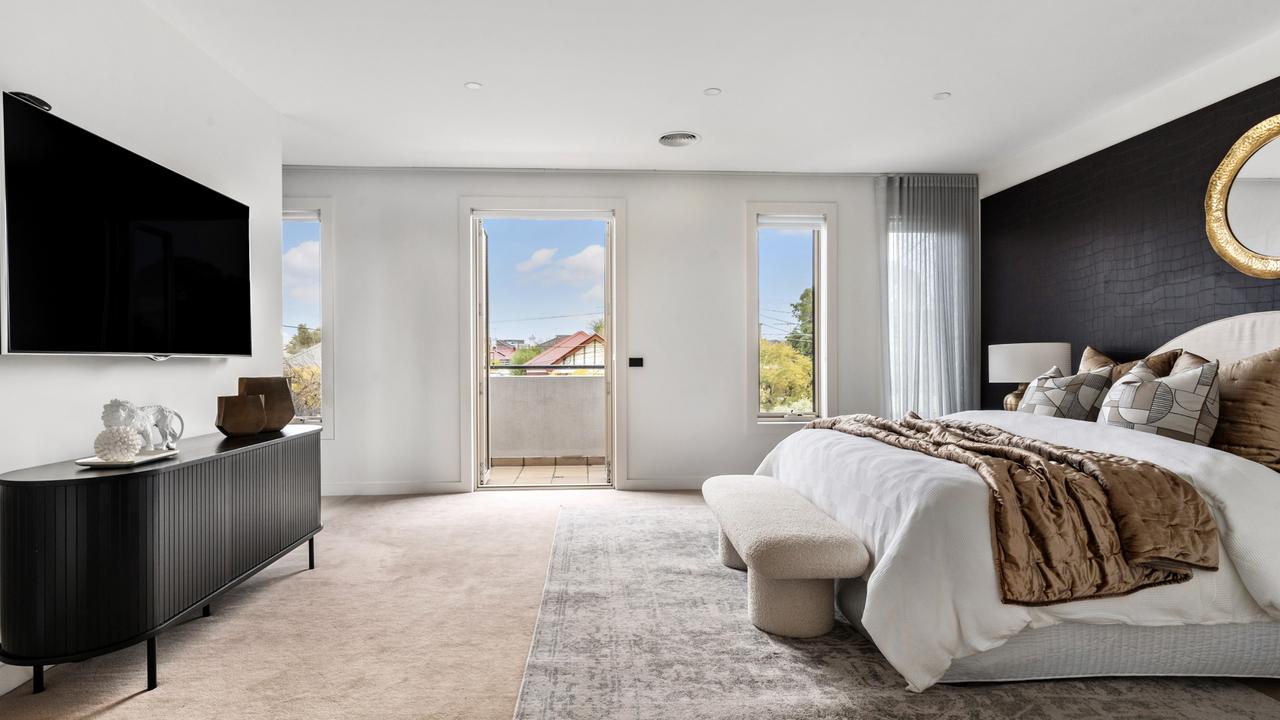 The expansive main bedroom with its own private balcony.