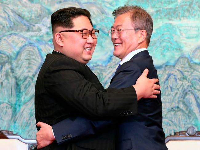 North Korean leader Kim Jong-un and South Korean President Moon Jae-in embrace each other after signing on a joint statement at the border village of Panmunjom in the Demilitarised Zone, South Korea. Picture: Korea Summit Press Pool via AP, File