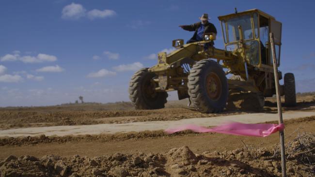 Phil Turner from The Marree Hotel re-creating the Marree Man with a tractor. Picture: Greg Dunstan