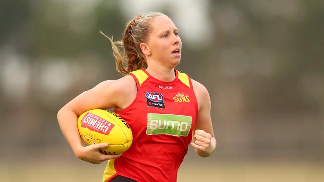 Georgia Breward runs during a Gold Coast Suns AFLW training session. (Photo by Chris Hyde/AFL Photos/Getty Images)