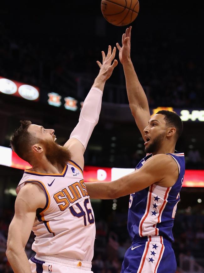 PHOENIX, ARIZONA – NOVEMBER 04: Ben Simmons #25 of the Philadelphia 76ers puts up a shot over Aron Baynes #46 of the Phoenix Suns during the first half of the NBA game at Talking Stick Resort Arena on November 04, 2019 in Phoenix, Arizona.