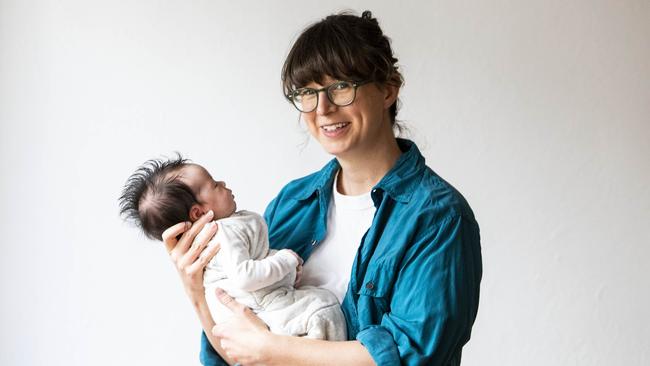 Nell Pierce, pictured with baby Mo, wrote about a young woman’s complex relationship with her foster brother. Picture: Aaron Francis