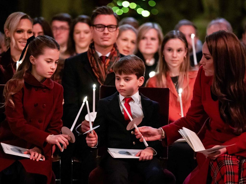 Princess Charlotte of Wales (L), Prince Louis of Wales (C) and Catherine, Princess of Wales attend the "Together At Christmas" Carol Service" at Westminster Abbey. Picture: AFP