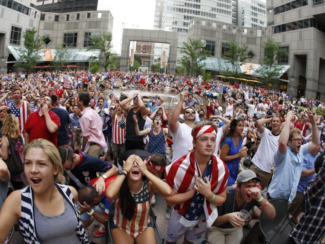 Fans react to the World Cup match between the United States and Belgium at a public viewing party in Philadelphia. AP Photo/Matt Slocum