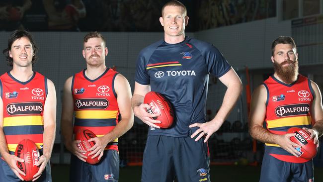 Sam Jacobs when he was appointed Adelaide SANFL assistant and midfield coach in 2022, alongside players (from left) Chris Hall, Josh Smithson and Isaya McKenzie. Picture: Dean Martin