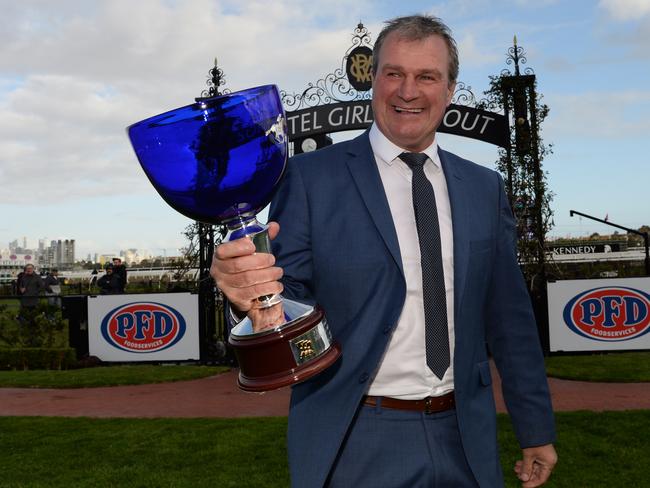 Trainer Darren Weir with the trophy after Humidor won the feature race.