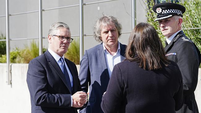 British PM Mr Starmer with Crime Commissioner Emily Spurrell (R), Deputy Chief Constable Chris Green (2R) and Liverpool City Mayor Steve Rotheram (2L) at Merseyside Police Headquarters. Picture: Getty Images