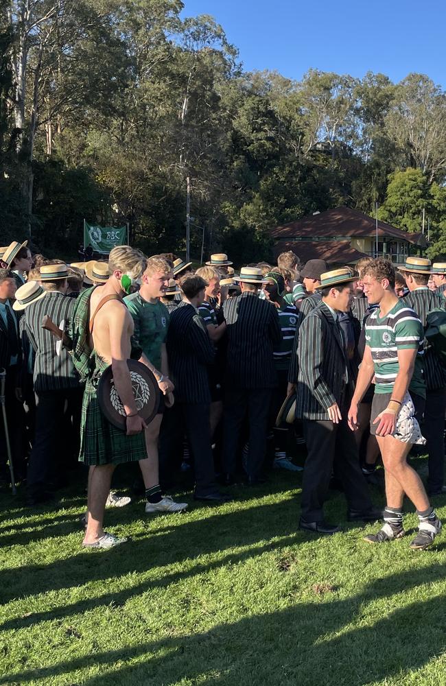 Jubilation on Miskin Oval. Cooper (right) being congratulated.