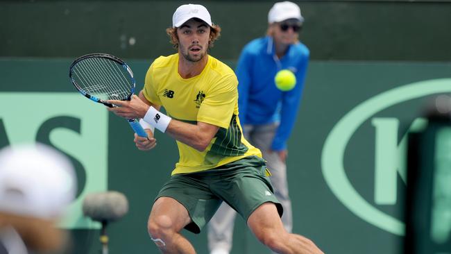 Jordan Thompson in action against Jan Satral during the Australia vs the Czech Republic Davis Cup first round match. Picture: AAP Image/Joe Castro