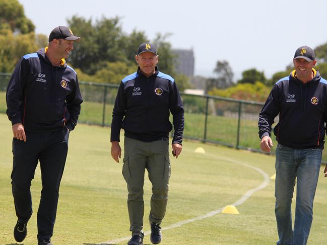 Happy times: Frankston Peninsula president Cameron Wallace, assistant coach Peter Buchanan and board member Craig Symons.