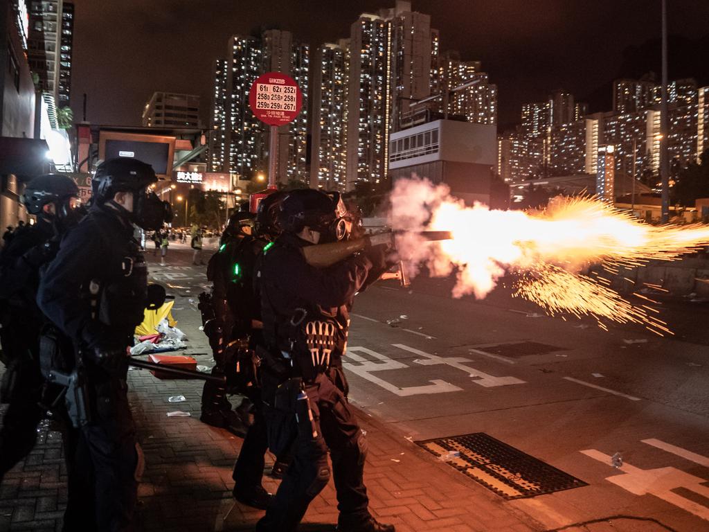 Riot police fire tear gas at protesters during a demonstration in Wong Tai Sin District on August 5 in Hong Kong. Picture: Anthony Kwan/Getty Images