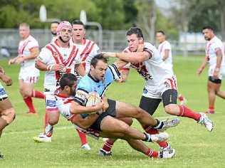 TAKE HIM DOWN: Rebel Jay Melrose brings down a player during the Group 2 rugby league match between the South Grafton Rebels and Woolgoolga Seahorses at McKittrick Park last Sunday. PHOTO: DEBRAH NOVAK