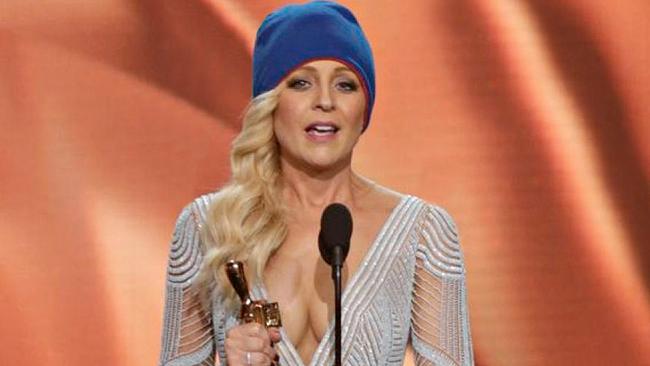 Bickmore accepting her Gold Logie while wearing a beanie to raise awareness of brain cancer. (Picture: Supplied)