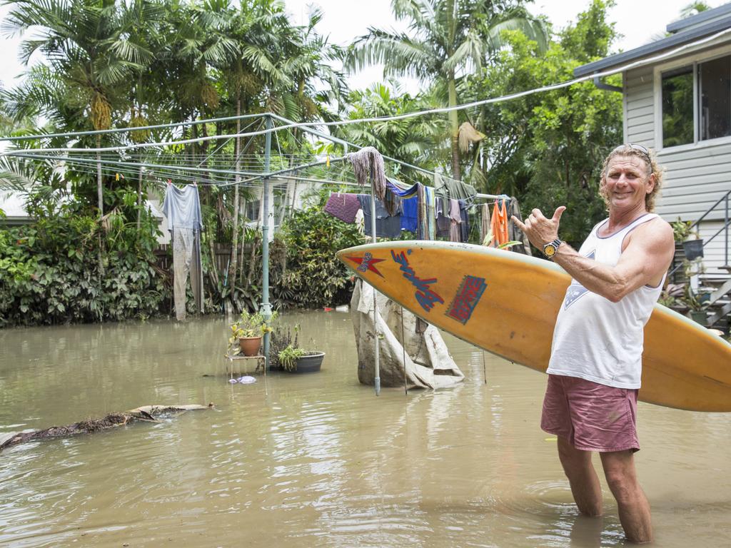 Long time local Greg Copnell who stayed on despite warnings at at his property in Campbell Street in Hermit Park where the water peaked at the top of his garage. When asked why he stayed, he replied 'if the ship was going down, I’m going with it, plus I had plenty of cold beer'. Picture: Lachie Millard