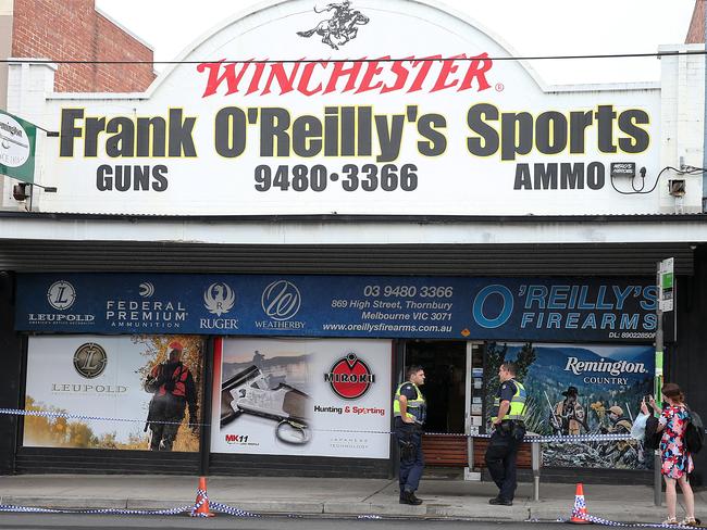 Police outside O'Reillys Firearms. Picture: Ian Currie