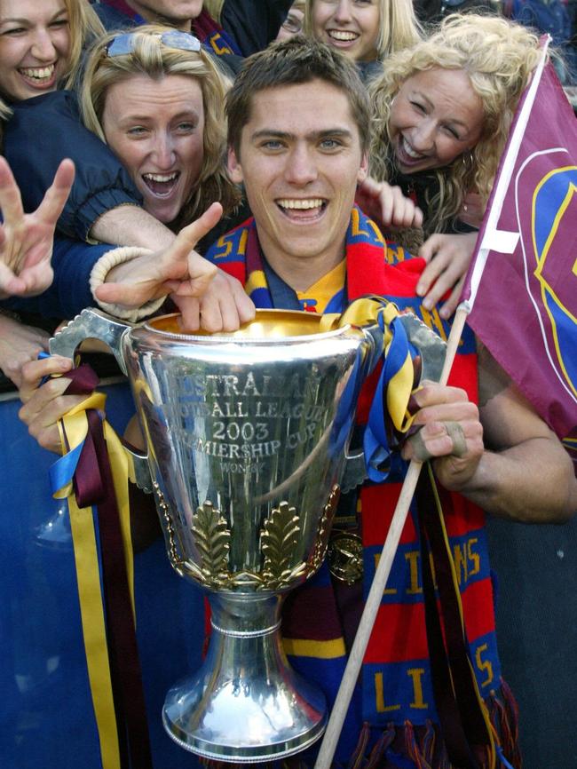 Black celebrating a Norm Smith Medal and premiership double in 2003.