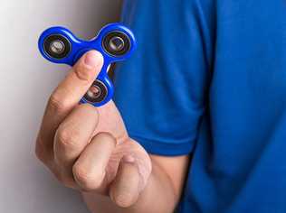 The fidget spinner craze has swept across Australia. Picture: ThamKC