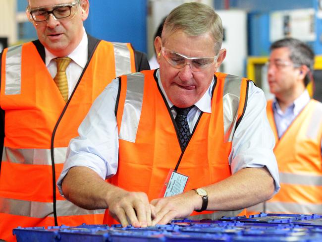 Confident ... Minister for Industry and Science, Ian Macfarlane at Monroe Australia’s plant in Clovelly Park, Adelaide.