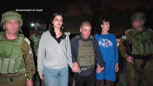 Natalie Shoshana Raanan (2nd L) and Judith Tai Raanan (2nd R) after being held hostage and later released by Hamas at an undiclosed location. Picture: AFP