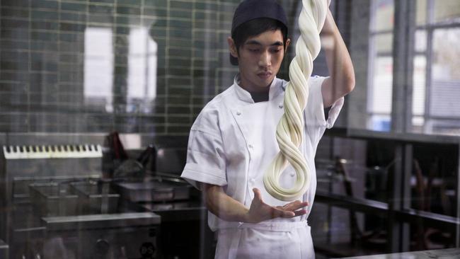 Hand-pulled noodles are made in full view of diners.