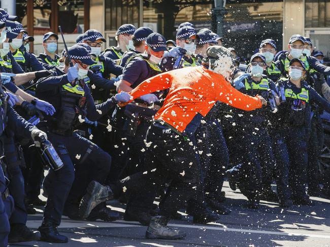 A protester is pepper sprayed on Bridge Rd, Richmond. Picture: Alex Coppel