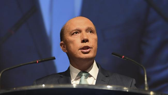 Australian Home Affairs Minister Peter Dutton speaks during the Australian Cyber Security Centre (ACSC) ACSC2018 conference in Canberra, Wednesday, April 11, 2018. (AAP Image/Lukas Coch) NO ARCHIVING