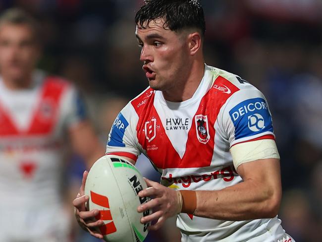 SYDNEY, AUSTRALIA - AUGUST 10: Kyle Flanagan of the Dragons runs the ball during the round 23 NRL match between St George Illawarra Dragons and Canterbury Bulldogs at Netstrata Jubilee Stadium, on August 10, 2024, in Sydney, Australia. (Photo by Jeremy Ng/Getty Images)