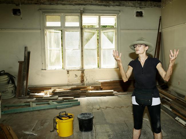 Pru Harper inside the home which was undergoing renovations. Picture: John Appleyard