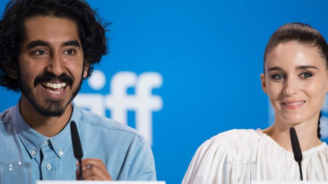 Dev Patel and Rooney Mara react to a question during the press conference fo Lion Toronto International Film Festival in Toronto. Picture: AFP