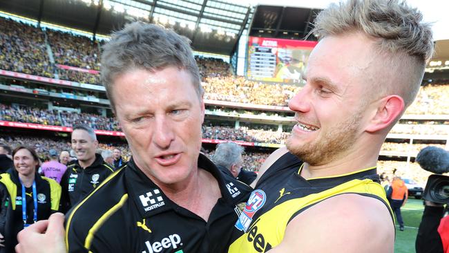 2019 AFL Grand Final. 28/09/2019.  Richmonds Brandon Ellis  hugs coach Damien Hardwick    after the 2019 AFL Grand Final match between the Richmond Tigers and the GWS Giants at the MCG on September 28, 2019 in Melbourne, Australia. Picture: Michael Klein.