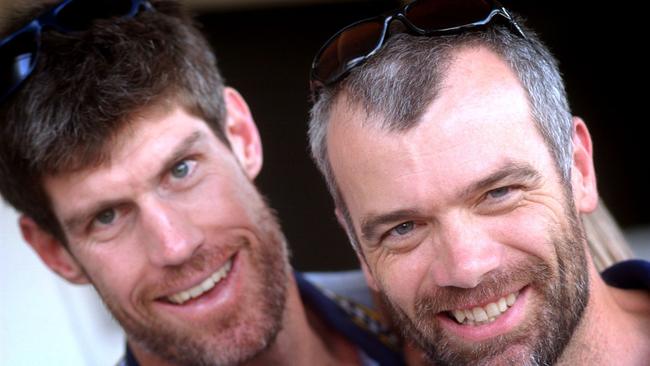 Still Bushy !!! Crocodiles will be keeping their unshaven look as they now believe it has bought them good luck. (L) Mike Kelly and (R) coach Ian Stacker after arriving back in Townsville today. Picture: Scott Radford-chisholm sr267004