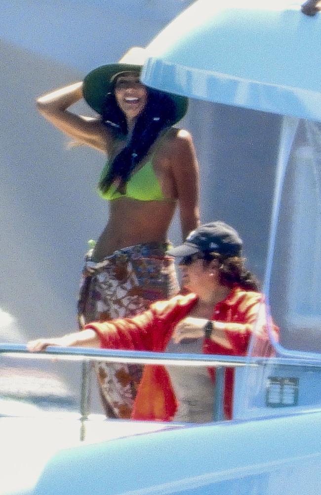The Aussie actress proudly wore the bargain buy on-board a luxury yacht during her Sydney holiday. Picture: ©MEDIA-MODE.COM