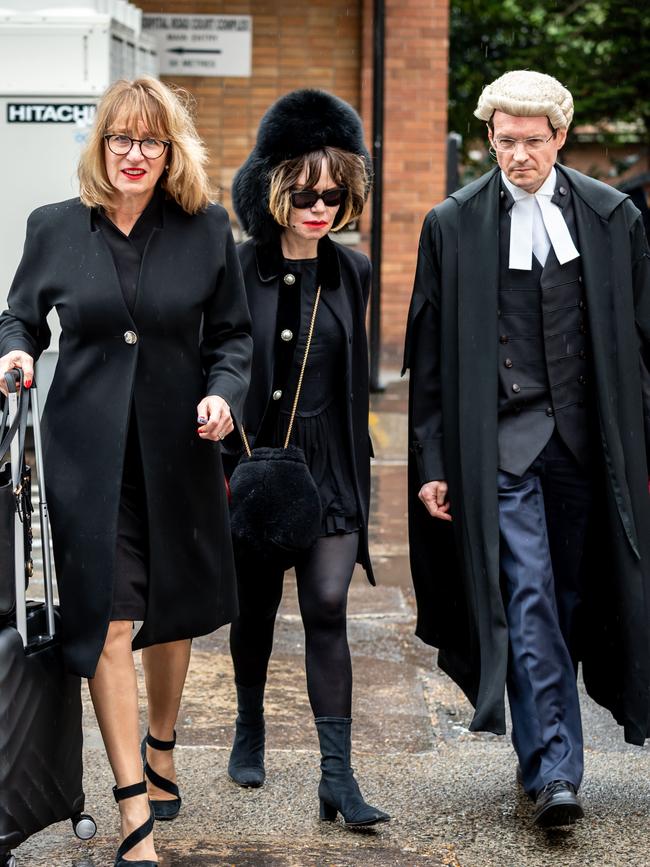 Viola La Valette (centre) outside the Supreme Court Sydney with her legal team. Picture: Monique Harmer.