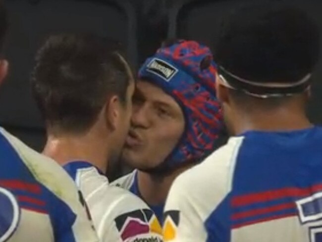 Kalyn Ponga and Mitch Pearce feeling the love.