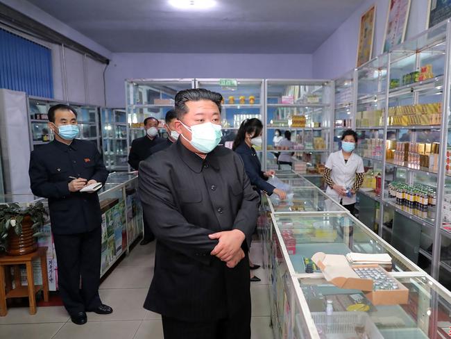 North Korean leader Kim Jong-un inspects a pharmacy in Pyongyang. Picture: AFP/KCNA via KNS