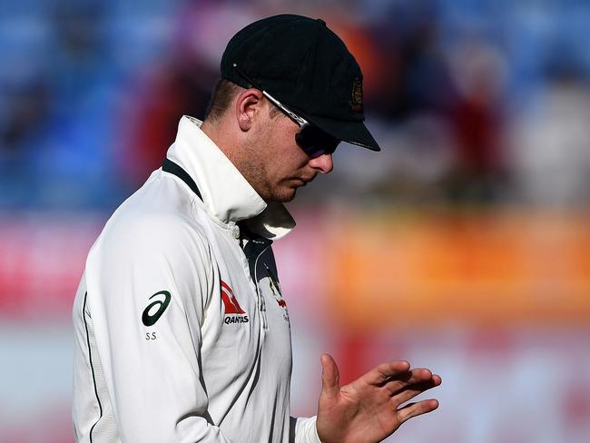 Steve Smith walks off the ground after a disappointing day for the Aussies. Picture: AFP