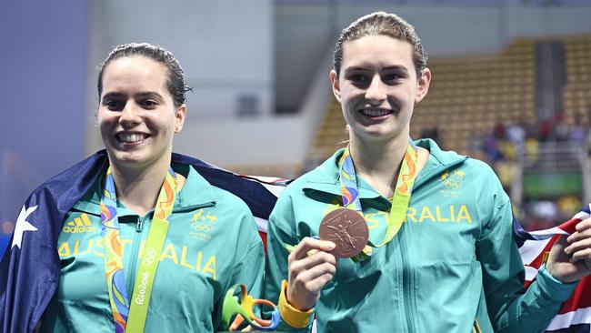 Australia's Maddison Keeney and Anabelle Smith pose during the podium ceremony of the Women's Synchronized 3m Springboard.