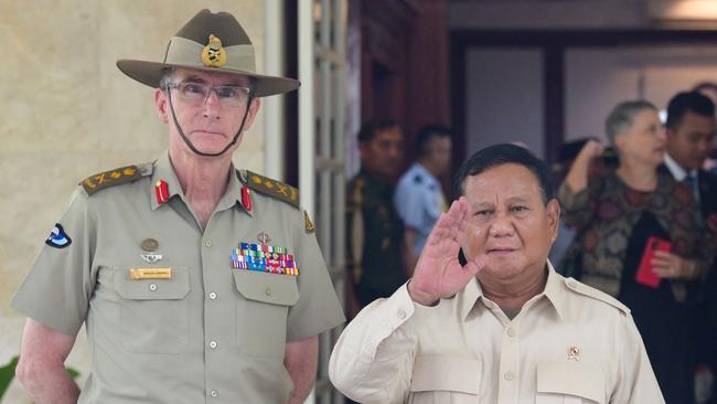 Indonesia's Defence Minister and presidential candidate Prabowo Subianto, right, with Australia's Chief of the Defence Force General Angus Campbell in Jakarta on Tuesday. Picture: AFP