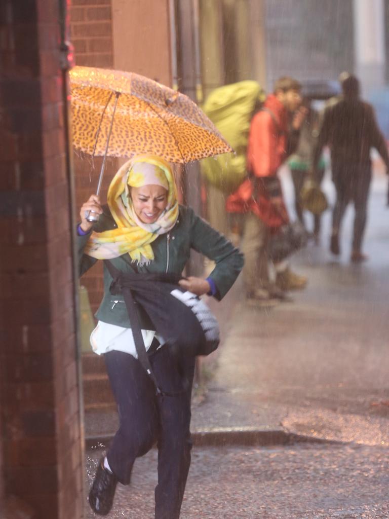 The low hits Sydney at Sunrise . Streets in surry hills are flooding .picture John Grainger